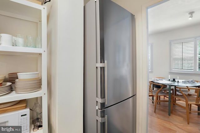 3503 Martha Custis Dr, Alexandria, VA 22302 - kitchen featuring freestanding refrigerator and light wood finished floors