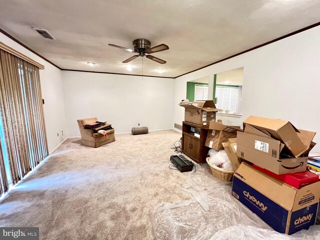 9939 Wingtip Rd, Philadelphia, PA 19115 - living area featuring crown molding, ceiling fan, carpet floors, and baseboards