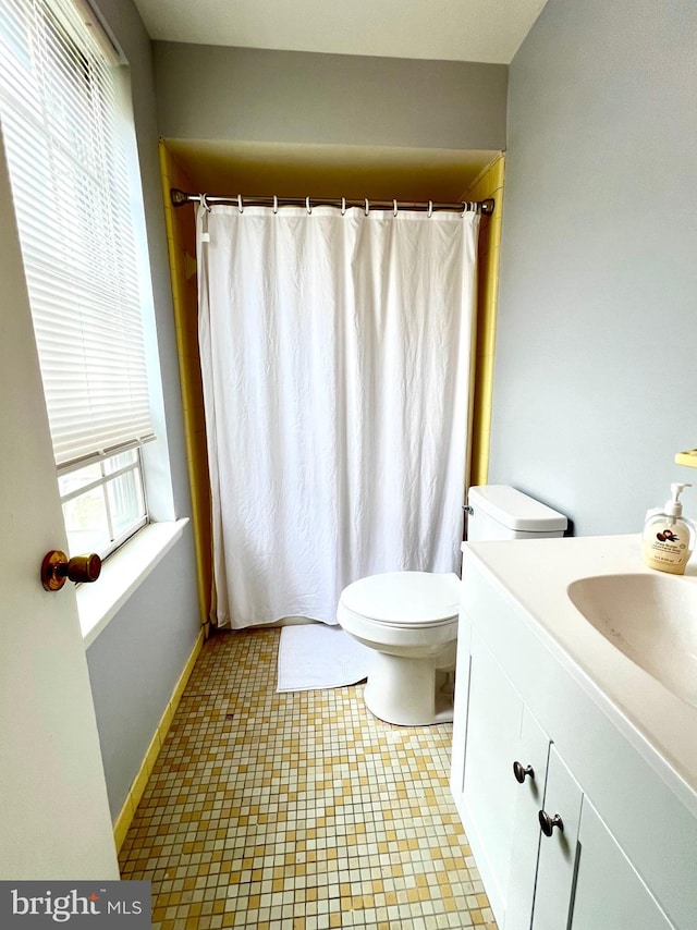 9939 Wingtip Rd, Philadelphia, PA 19115 - bathroom with toilet, vanity, and a shower with curtain