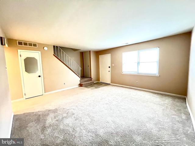 9939 Wingtip Rd, Philadelphia, PA 19115 - foyer entrance featuring carpet flooring, stairway, and baseboards