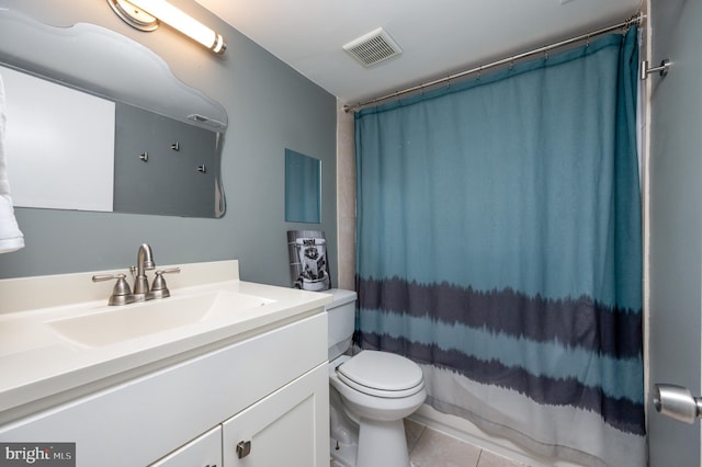 7708 Hanover Pkwy Unit 303, Greenbelt, MD 20770 - bathroom with toilet, vanity, tile patterned flooring, and a shower with curtain