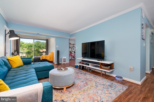 7708 Hanover Pkwy Unit 303, Greenbelt, MD 20770 - living room featuring wood finished floors, ornamental molding, and baseboards