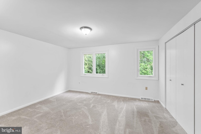 24 Beechtree Ln, Mountville, PA 17554 - unfurnished bedroom with multiple windows, a closet, and carpet