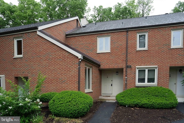 24 Beechtree Ln, Mountville, PA 17554 - view of front of property with brick siding, a chimney, and roof with shingles