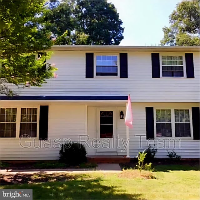 11708 Eisenhower Ln, Fredericksburg, VA 22407 - view of front facade featuring a front lawn