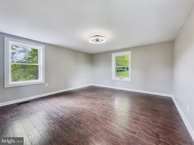 4920 Ed Mcclain Rd, Monrovia, MD 21770 - spare room featuring dark wood-type flooring and baseboards