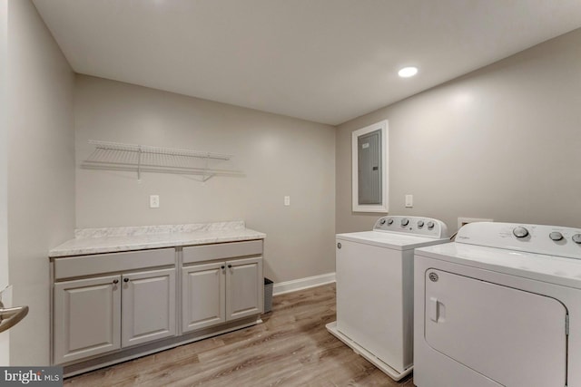 43268 Heavenly Cir, Leesburg, VA 20176 - washroom with independent washer and dryer, electric panel, light wood-type flooring, recessed lighting, and baseboards