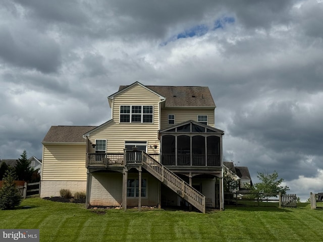 43268 Heavenly Cir, Leesburg, VA 20176 - back of property with a sunroom, a deck, a yard, and stairway