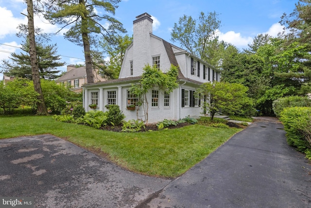 60 Old Eagle School Rd, Wayne, PA 19087 - view of side of property with a chimney and a yard