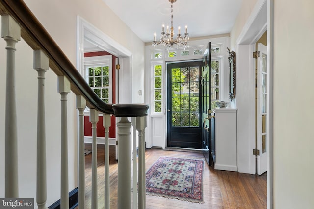 60 Old Eagle School Rd, Wayne, PA 19087 - foyer featuring a chandelier, wood-type flooring, stairs, and baseboards