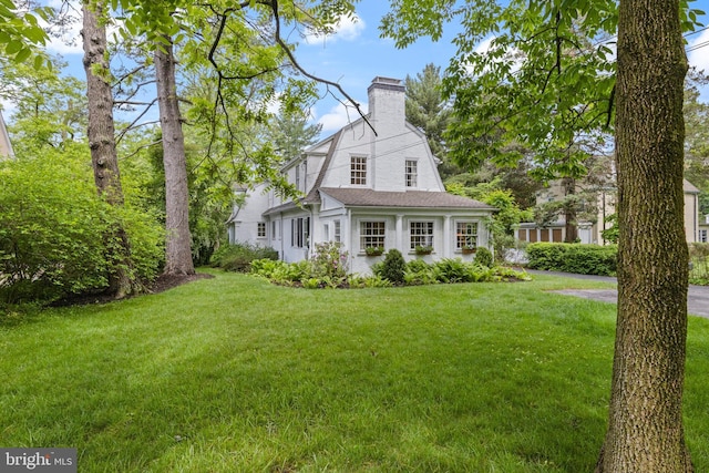 60 Old Eagle School Rd, Wayne, PA 19087 - dutch colonial with a chimney, a front yard, and a gambrel roof