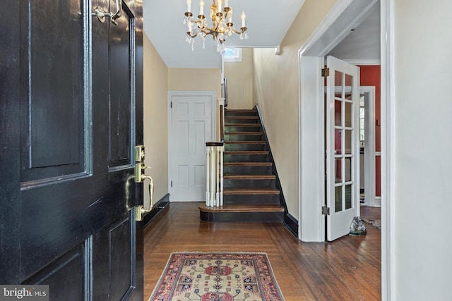 60 Old Eagle School Rd, Wayne, PA 19087 - foyer with dark wood-style floors, a chandelier, and stairway