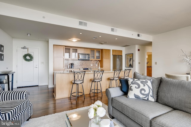 675 President St Unit 2105, Baltimore, MD 21202 - living area featuring dark wood-style floors