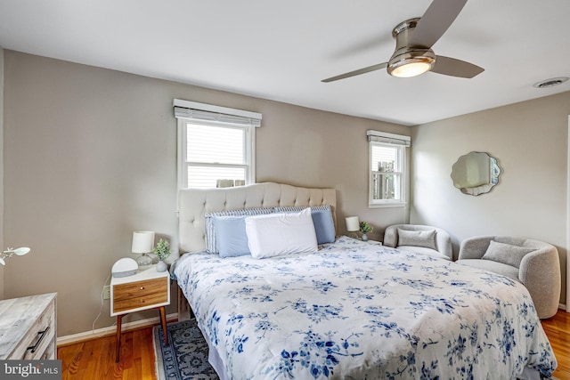 3324 Lorcom Ln, Arlington, VA 22207 - bedroom with multiple windows, wood finished floors, and ceiling fan