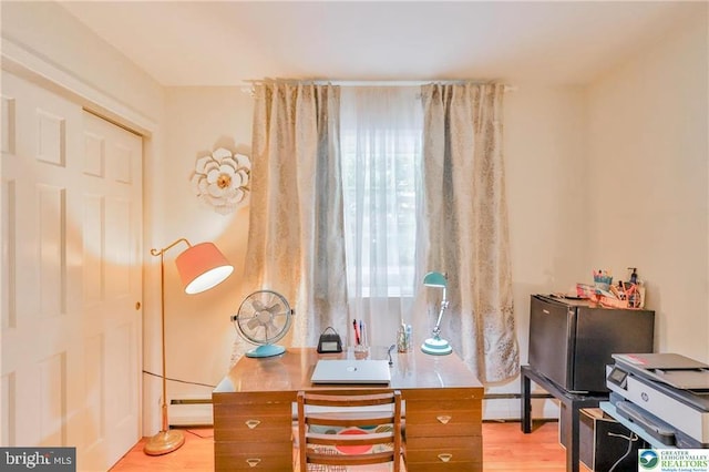 113 S Fairview St, Macungie, PA 18062 - home office featuring a baseboard heating unit, light wood finished floors, and healthy amount of natural light
