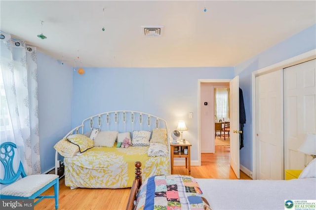 113 S Fairview St, Macungie, PA 18062 - bedroom with wood finished floors, a closet, and baseboards