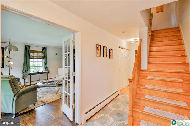 113 S Fairview St, Macungie, PA 18062 - staircase with a baseboard heating unit and wood finished floors