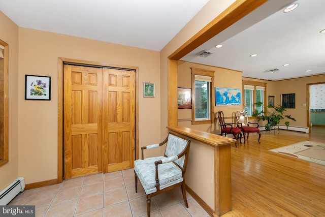130 Bellmawr Ave, Haddon Heights, NJ 08035 - foyer entrance featuring a baseboard radiator, baseboards, recessed lighting, and light wood finished floors