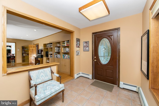 130 Bellmawr Ave, Haddon Heights, NJ 08035 - foyer with light tile patterned flooring and a baseboard heating unit