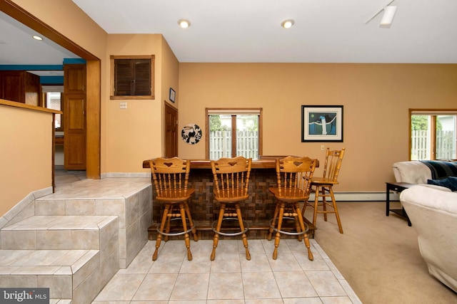 130 Bellmawr Ave, Haddon Heights, NJ 08035 - dining area with healthy amount of natural light, baseboard heating, light tile patterned flooring, recessed lighting, and a dry bar