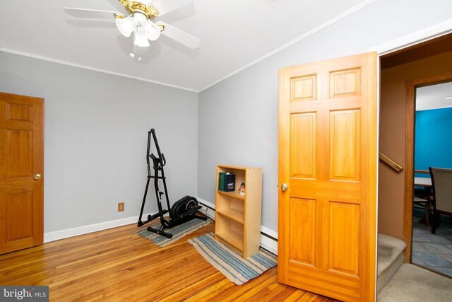 130 Bellmawr Ave, Haddon Heights, NJ 08035 - exercise area with wood finished floors, a ceiling fan, crown molding, a baseboard radiator, and baseboards