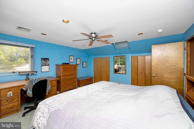 130 Bellmawr Ave, Haddon Heights, NJ 08035 - bedroom featuring vaulted ceiling, an office area, two closets, light colored carpet, and a ceiling fan