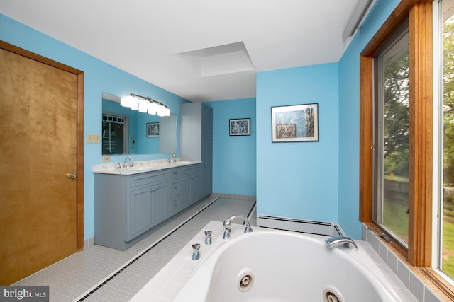 130 Bellmawr Ave, Haddon Heights, NJ 08035 - bathroom with a baseboard heating unit, a tub with jets, double vanity, and healthy amount of natural light