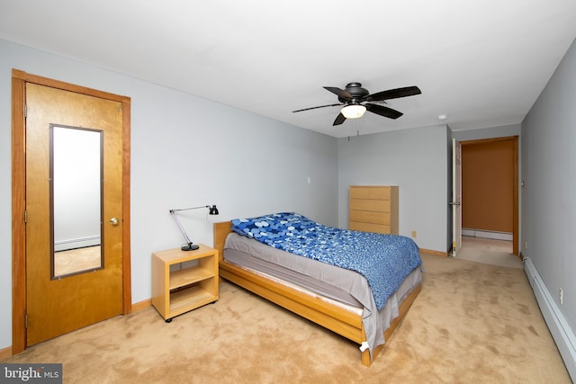 130 Bellmawr Ave, Haddon Heights, NJ 08035 - bedroom with a baseboard radiator, light colored carpet, and baseboards