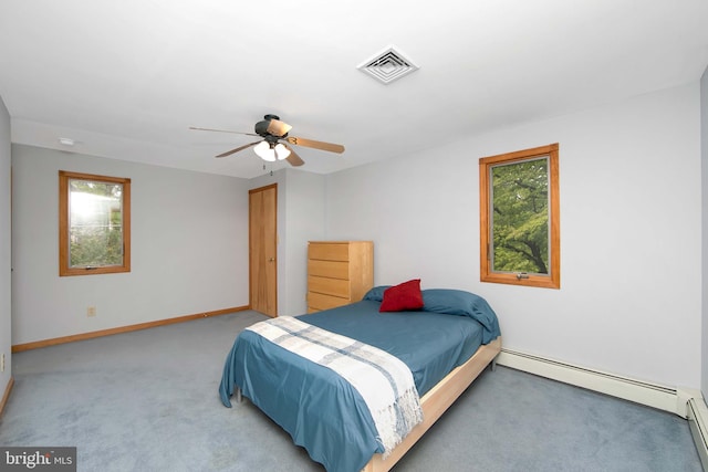 130 Bellmawr Ave, Haddon Heights, NJ 08035 - bedroom featuring carpet flooring, multiple windows, baseboard heating, and baseboards