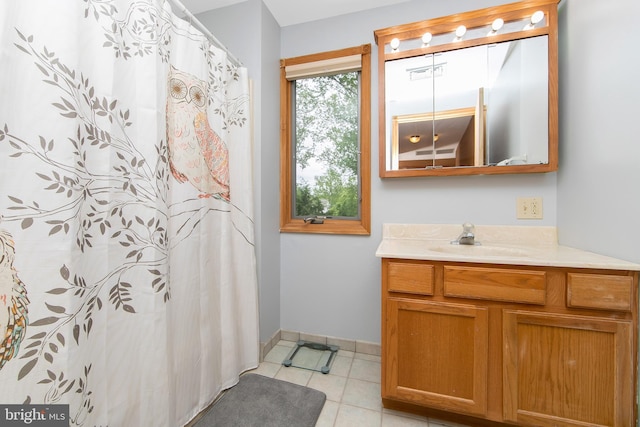 130 Bellmawr Ave, Haddon Heights, NJ 08035 - full bathroom with vanity, baseboards, tile patterned flooring, and curtained shower