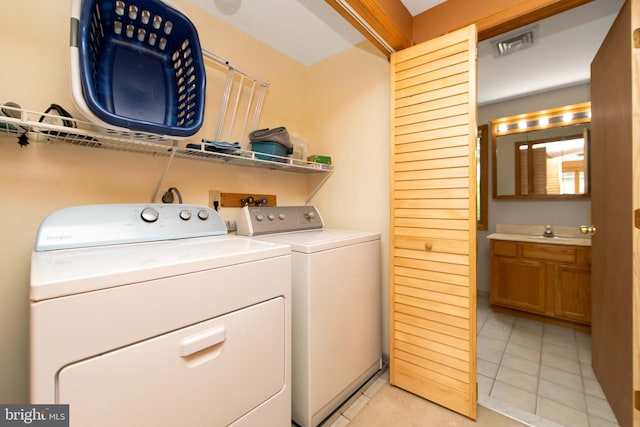 130 Bellmawr Ave, Haddon Heights, NJ 08035 - laundry area featuring separate washer and dryer and light tile patterned floors