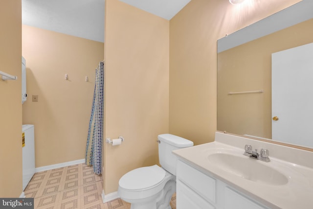 4078 Rose Bud Ct, Edinburg, VA 22824 - bathroom featuring toilet, vanity, tile patterned floors, and baseboards