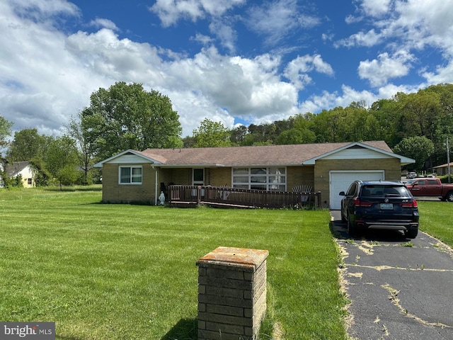 177 Fort Ashby Rd, Fort Ashby, WV 26719 - ranch-style house featuring a garage, a front yard, and driveway