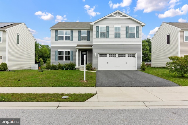 115 Shiningfield Ct, Middle River, MD 21220 - view of front of home featuring asphalt driveway, a front lawn, and an attached garage