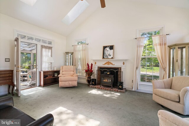 43971 Urbancrest Ct, Ashburn, VA 20147 - carpeted living room with high vaulted ceiling, healthy amount of natural light, a skylight, a ceiling fan, and beamed ceiling