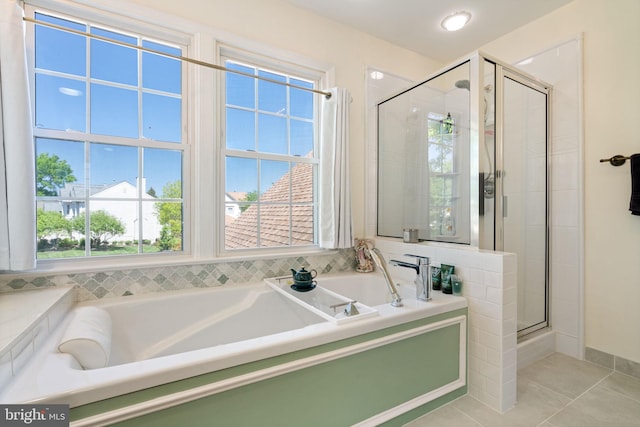 43971 Urbancrest Ct, Ashburn, VA 20147 - full bathroom featuring a shower stall, a bath, and tile patterned flooring