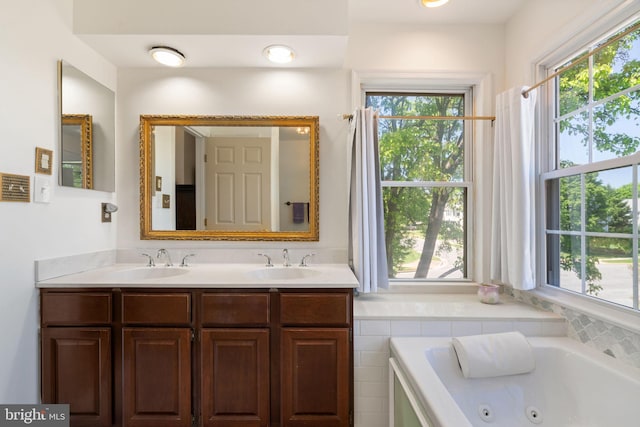 43971 Urbancrest Ct, Ashburn, VA 20147 - bathroom featuring double vanity and a tub with jets