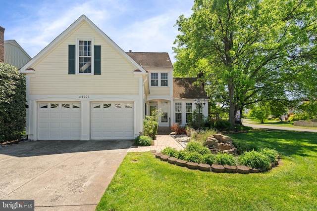 43971 Urbancrest Ct, Ashburn, VA 20147 - traditional home with an attached garage, driveway, a front lawn, and roof with shingles