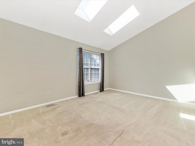 231 Coventry Sq Unit 231, Sterling, VA 20164 - spare room with a skylight, light carpet, lofted ceiling, and baseboards