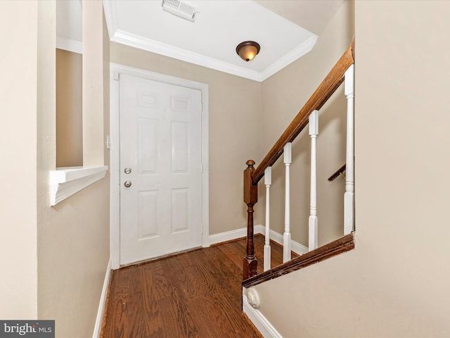 231 Coventry Sq Unit 231, Sterling, VA 20164 - foyer entrance featuring wood finished floors, crown molding, baseboards, and stairway