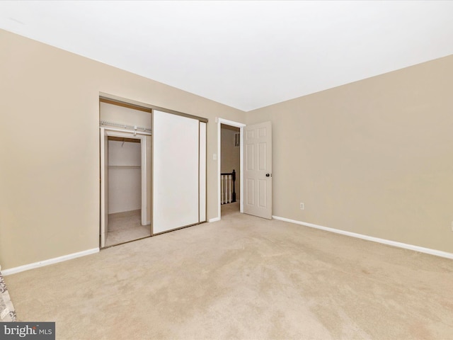 231 Coventry Sq Unit 231, Sterling, VA 20164 - unfurnished bedroom with light colored carpet, a closet, and baseboards