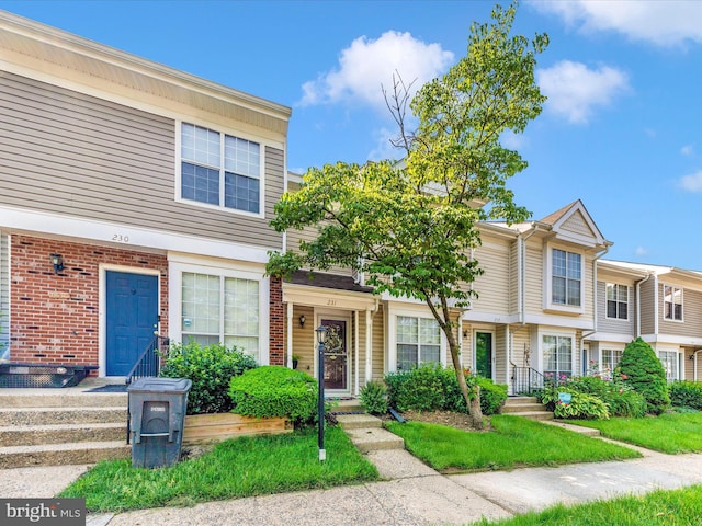 231 Coventry Sq Unit 231, Sterling, VA 20164 - view of property with brick siding
