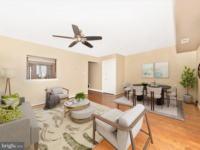 231 Coventry Sq Unit 231, Sterling, VA 20164 - living room featuring light wood-type flooring, baseboards, and ceiling fan