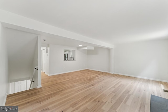 13929 Carthage Cir, Burtonsville, MD 20866 - additional living space with light wood-style flooring and baseboards