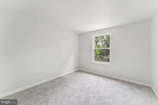 13929 Carthage Cir, Burtonsville, MD 20866 - carpeted empty room featuring baseboards