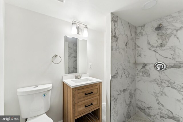 13929 Carthage Cir, Burtonsville, MD 20866 - bathroom featuring a marble finish shower, vanity, and toilet