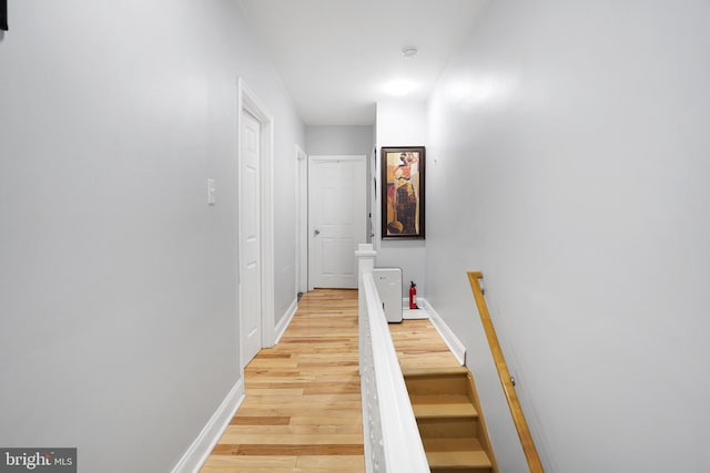 851 Carl Miller Blvd, Camden, NJ 08104 - hall featuring light wood-style flooring, baseboards, and an upstairs landing