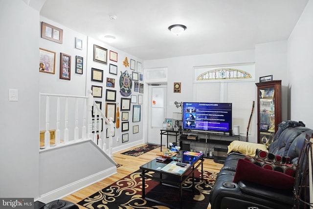 851 Carl Miller Blvd, Camden, NJ 08104 - living area featuring wood finished floors, stairs, and baseboards
