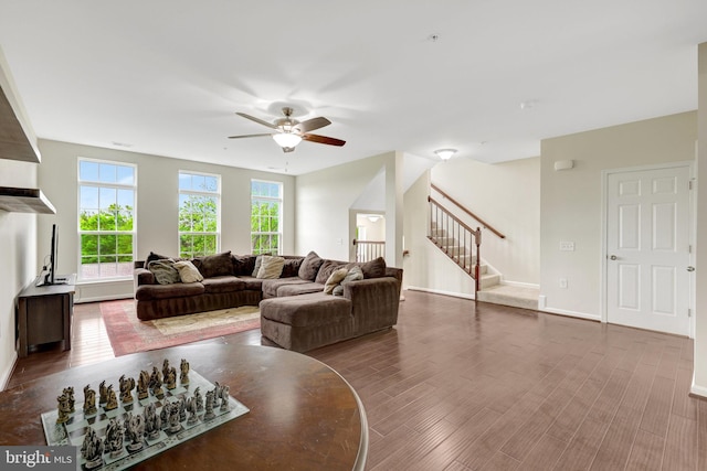 43469 Town Gate Sq, Chantilly, VA 20152 - living room featuring ceiling fan, healthy amount of natural light, wood finished floors, and stairway