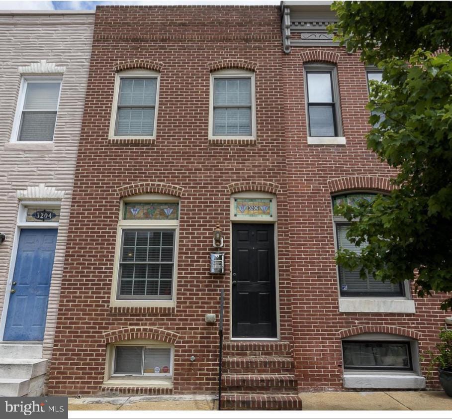 3206 Fait Ave, Baltimore, MD 21224 - townhome / multi-family property featuring entry steps and brick siding